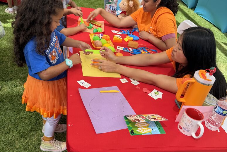 residents teaching nutrition at an annual Children's Day