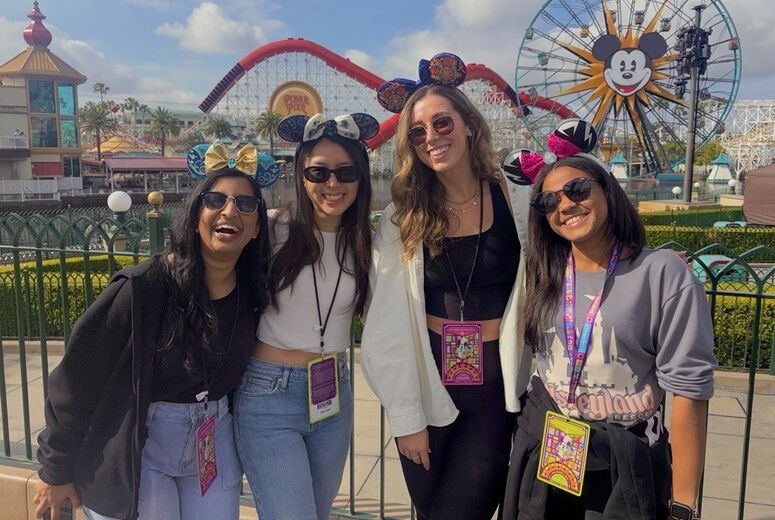 Residents taking a group photo at Disneyland