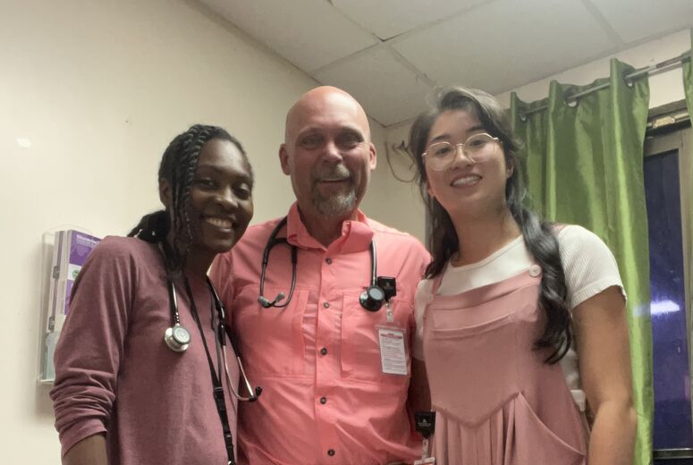 DR. CAI WITH HEALTHCARE STAFF IN GUAM