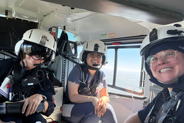 DR. HUYNH AND OUR AMAZING NURSE AND RESPIRATORY THERAPIST LOCKED AND LOADED FOR TRANSPORT VIA HELICOPTER