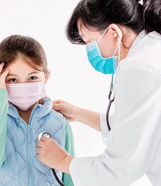 Nurse with pediatric patient