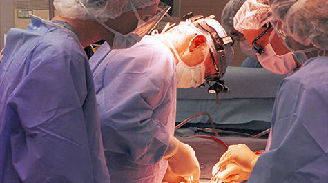 Dr. Leonard Bailey performing heart surgery 