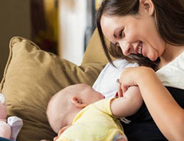 Mother breastfeeding baby