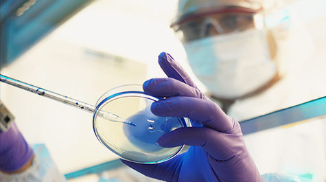 Clinical researcher in a lab