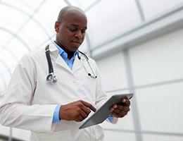 Doctor on tablet